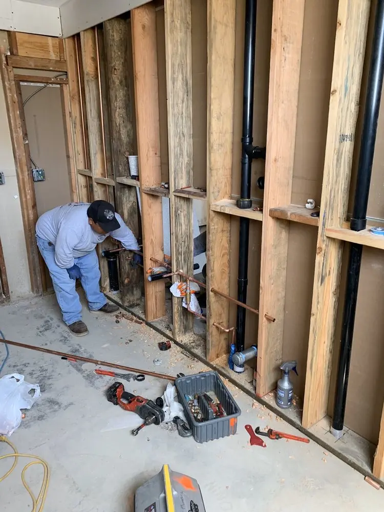 Commercial rough-in plumbing for Water Heater Replacement in Pine Lake
